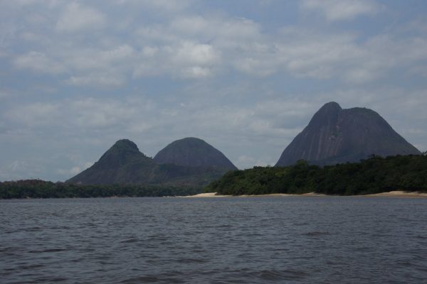 Getting close from the Inirida River to Mavecure Monoliths, Guainia Colombia Getting close from the Inirida River to Mavecure Monoliths, Guainia Colombia